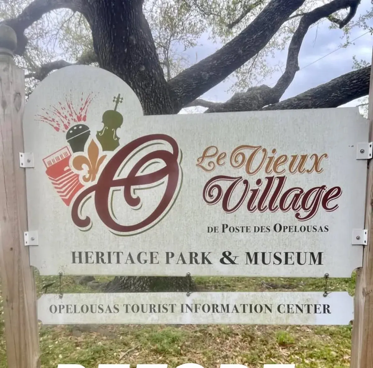 Le Vieux Village sign, one pass with MC-20 before cleaning