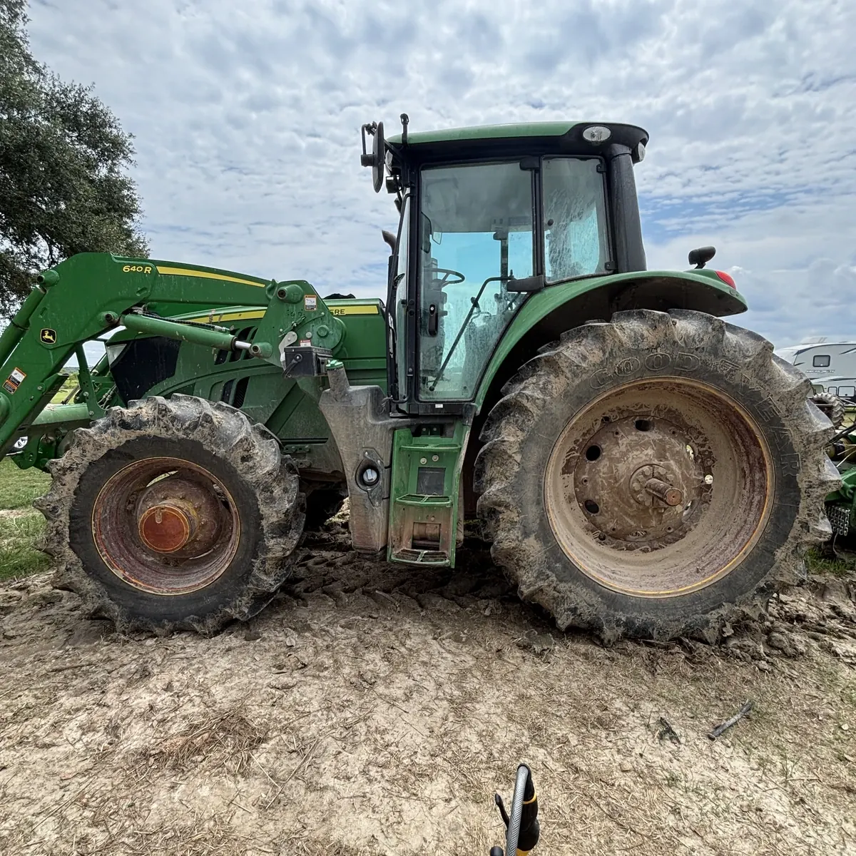 John Deere tractor before cleaning
