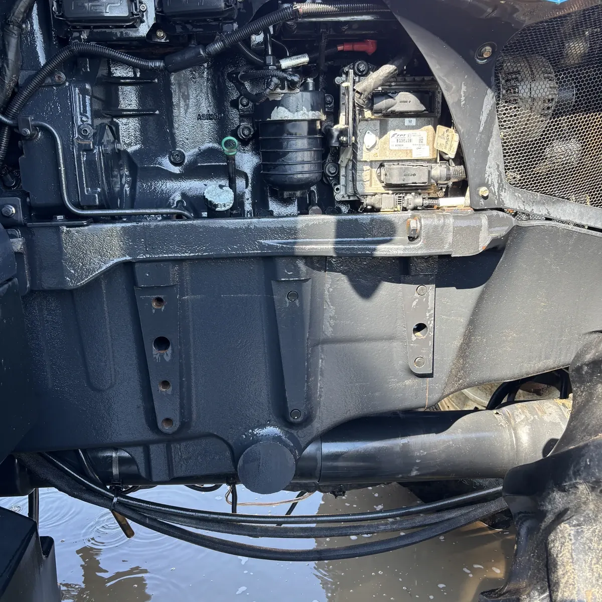 New Holland engine underside after cleaning